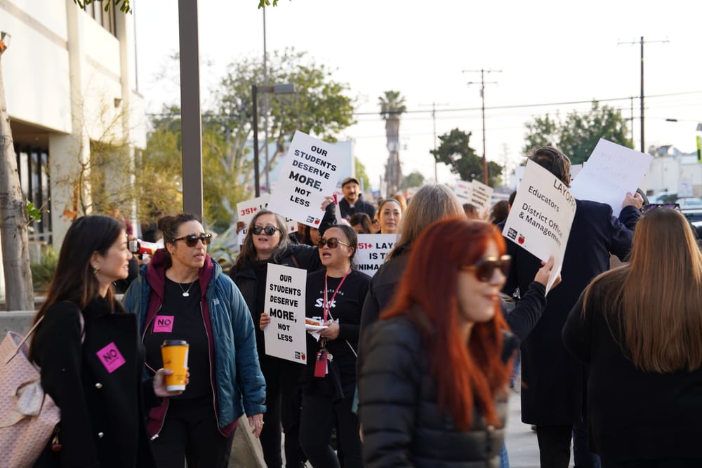 SAUSD staff outside the District headquarters protesting against layoffs. (Daniel Diaz/The Santanero)